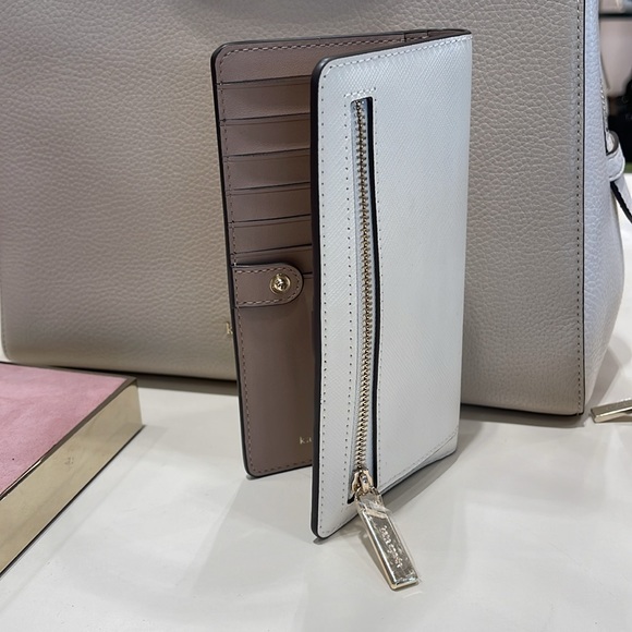 Kate Spade Madison Large Slim Bifold Wallet
Meringue 
NWT - Picture 12 of 16